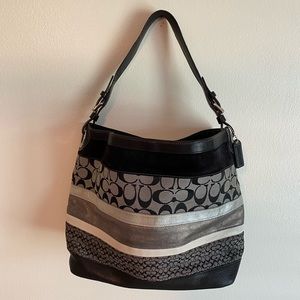 Black and silver Coach purse